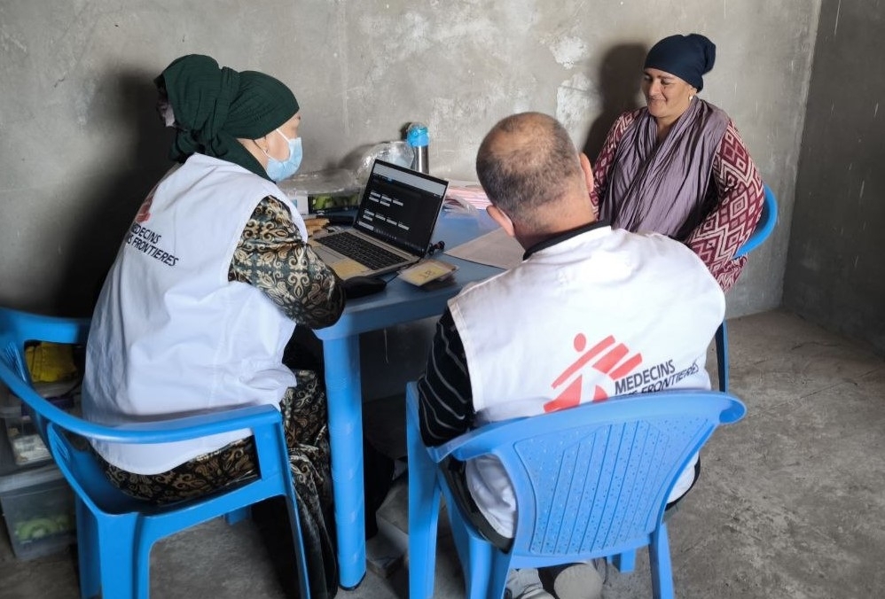 Fig 2 An MSF nurse is registering a villager who came for screening to a temporary X-ray facility set up by the project staff in Zarbdor village, Kulob, Tajikistan. (c) Kamola Rasulova/MSF Fig 2 An MSF nurse is registering a villager who came for screening to a temporary X-ray facility set up by the project staff in Zarbdor village, Kulob, Tajikistan. (c) Kamola Rasulova/MSF